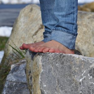 barefoot, rocks