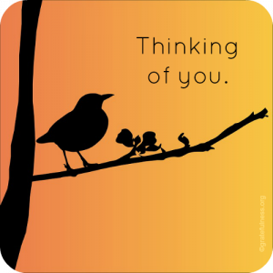 Silhouette of a bird singing on a branch against a bright orange background.
