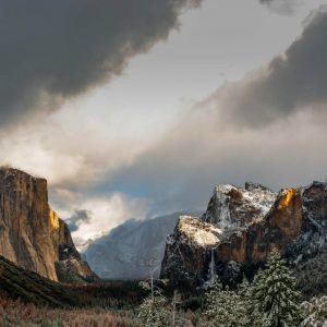 mountain range with storm clouds behind